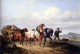 Us horses pulling a hay wagon in a landscape
